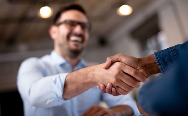 Business people shaking hands.