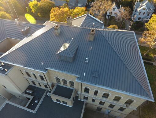 After Drone photos of an RMer Span Historic Elementary School