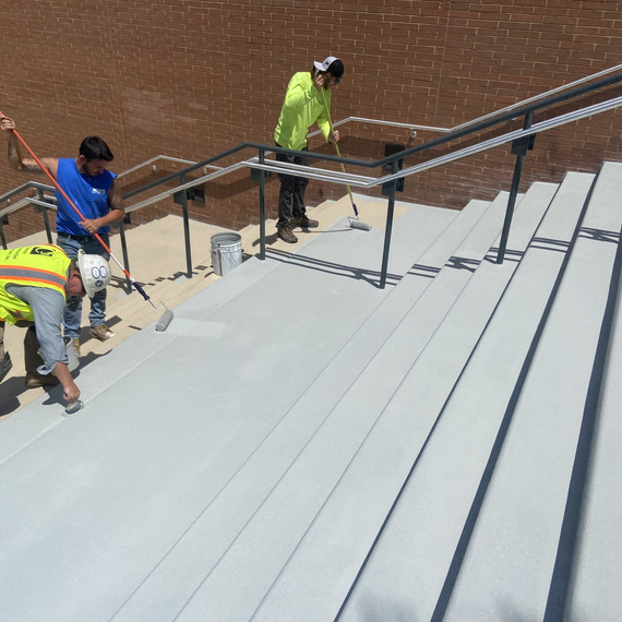 Dura-walk being applied to stairs by Will Pancoast 2021