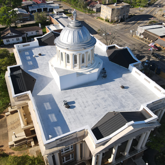 Historic Anderson County Courthouse in Palestine, Texas with Drone. Restored with Silver-Shield, Optimax in Weatherking Flexbase, and Stressbase 80 as a vapor barrier. Insulation down in Insul-Lock. Features LiquiTec and R-Mer Wall Panels